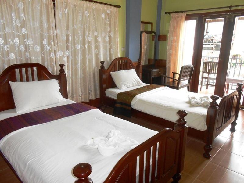 Domon Hotel Vang Vieng Rum bild